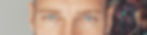Close-up of a man's eyes, light skin, looking intently forward.
