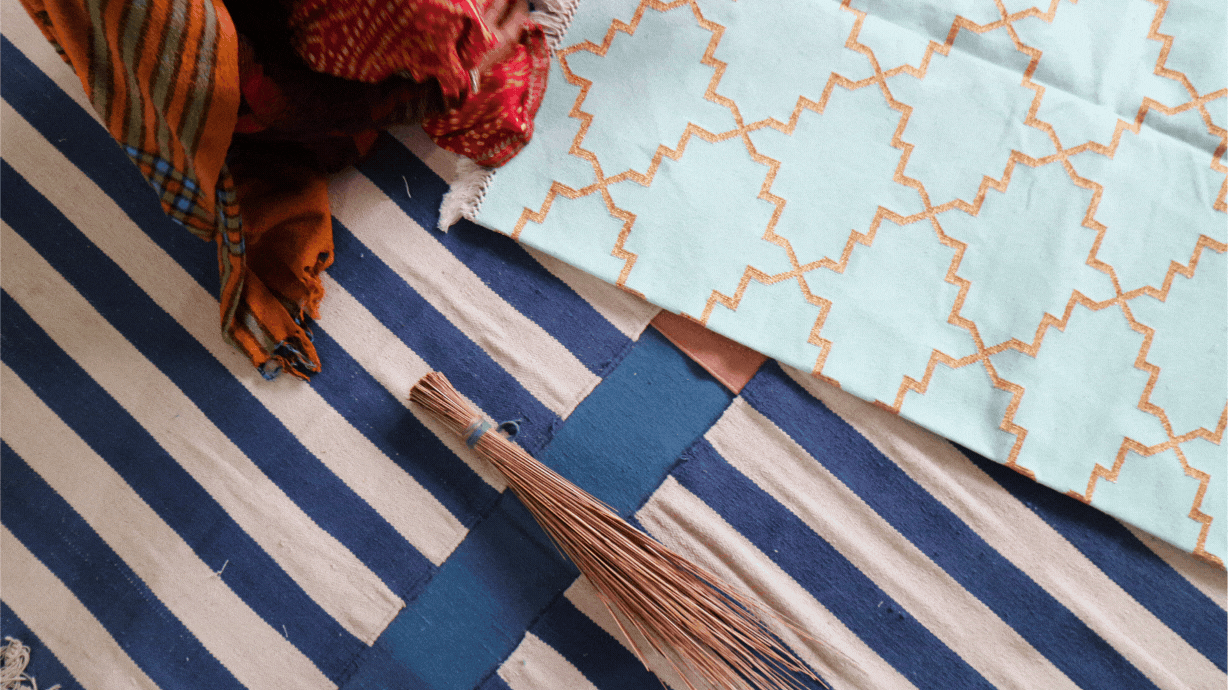 lady making an artisan carpet