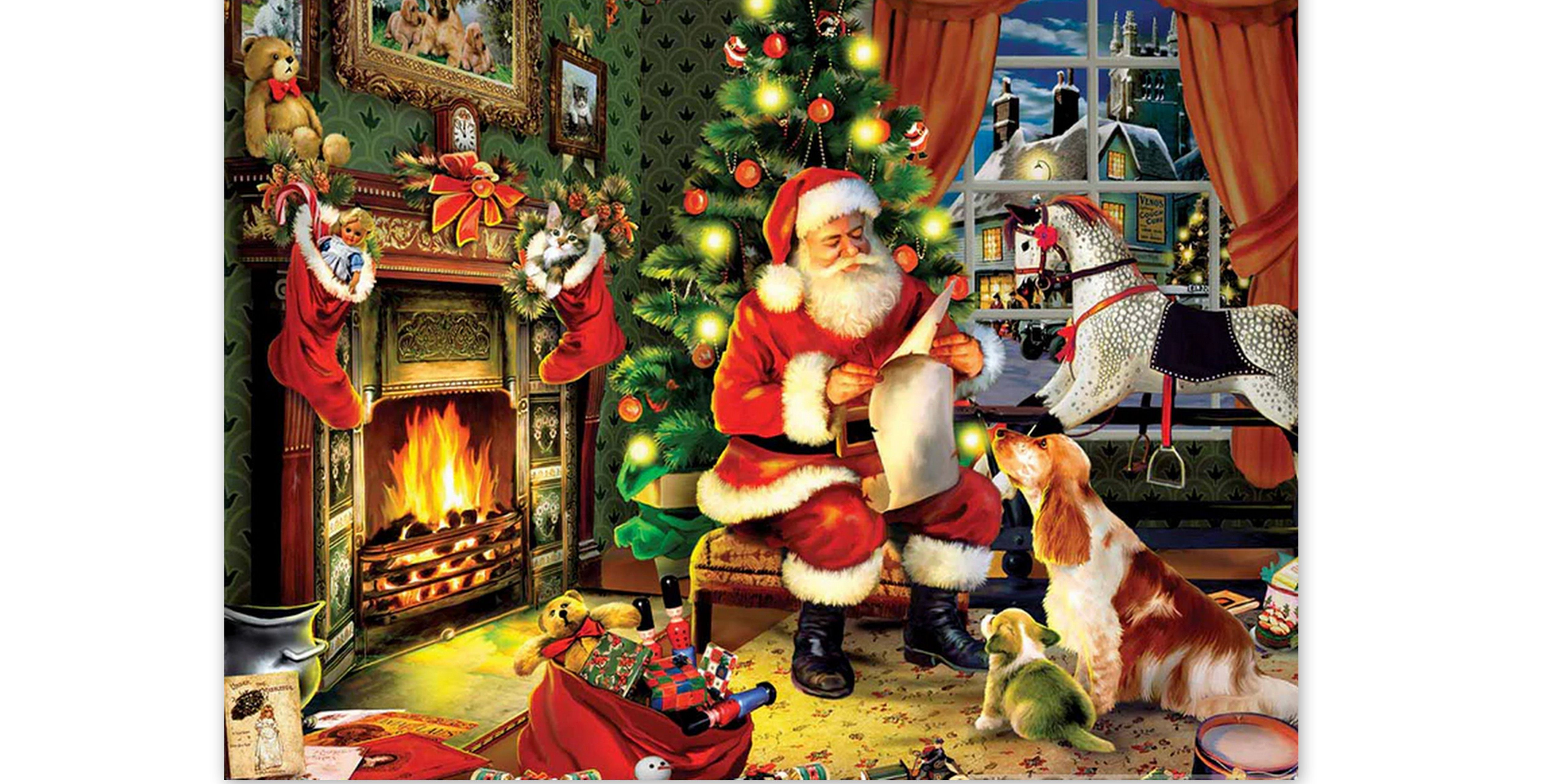 le père noël lit la lettre des enfants