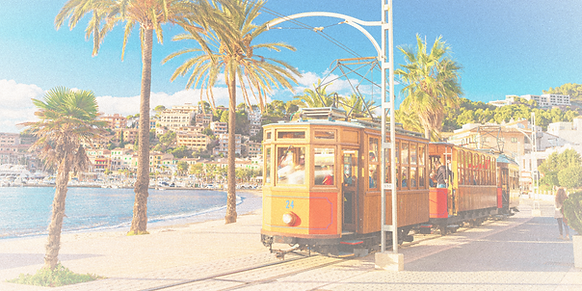 The famous orange tram runs from Soller to Port de Soller, Mallorca, Spain_edited_edited.p
