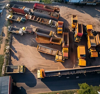 Firefly drone view indian dumper truck Parking Yard Management in industrial area 16532.jp