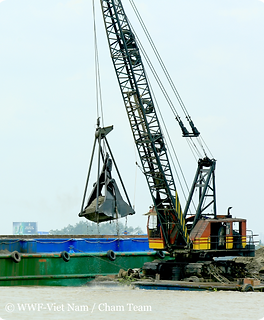 1.-Boat-dredging-sand-in-vietnams-mekong-delta.png