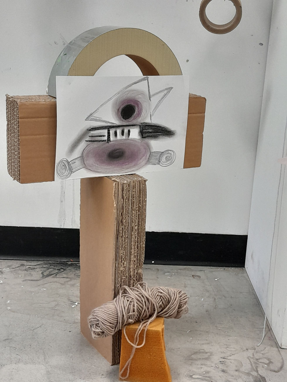 PlayArt character sculpture:
PlayArt character created from wool, cardboard, wood and drawing during Maria Grujicic’s tactile art process.