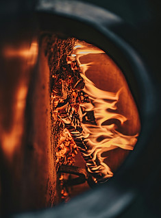 a close up of a fire burning in a brick