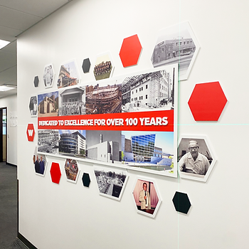 An office wall with dimensional signage
