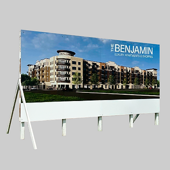 Rigid substrate mounted to posts for a "coming soon" construction site sign