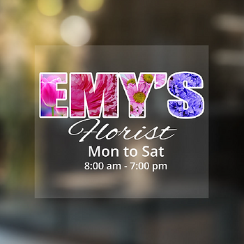 Transparent decal with colorful text and white ink on glass.