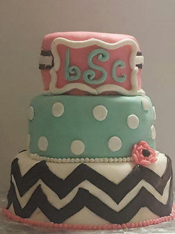 3 Tier Cake (size 10 inch, 8 inch, and 6 inch) with Fondant Icing and candy beads.