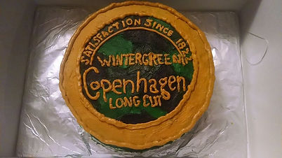 Double Layered 8 Inch Round Cake with Buttercream Icing and decorated as a Copenhagen Tobacco Can
