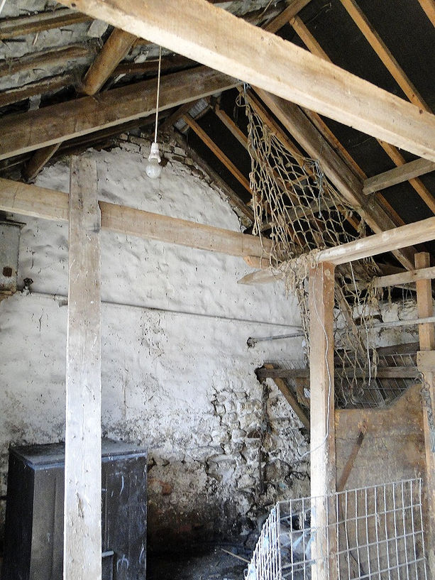 Original barn interior before renovation.jpg