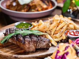 Families celebrating Mother's Day lunch at Viva Toro Williamsburg with live music.