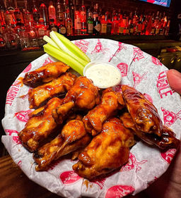 $1 wings. Happy Hour at The Rabbit Hole in Astoria, Queens 11103