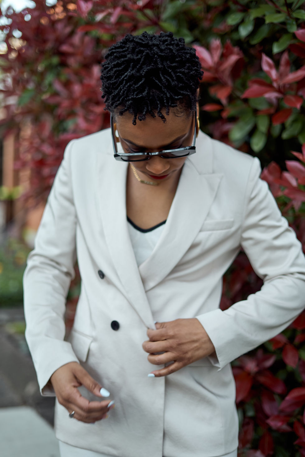 Style Savant buttoning her blazer