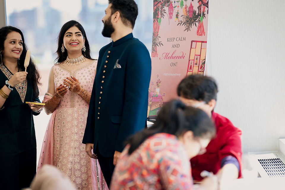 Wedding guests mingling during a multicultural wedding welcome brunch