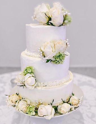 wedding cake with white roses