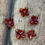 Thumbnail: Tiny Red / Orange Lampwork Flower Beads