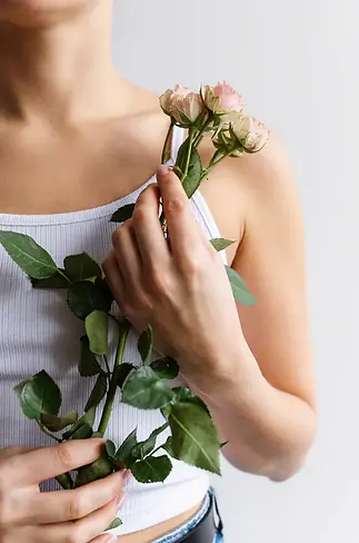 hand-holding-elegant-flower.webp