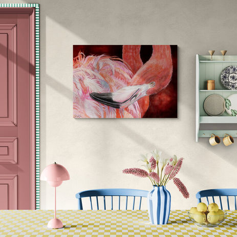 'FeatherBorne' a pink flamingo canvas print is hanging on a wall above a table