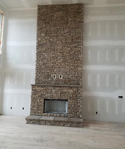 Inside stone wall fireplace