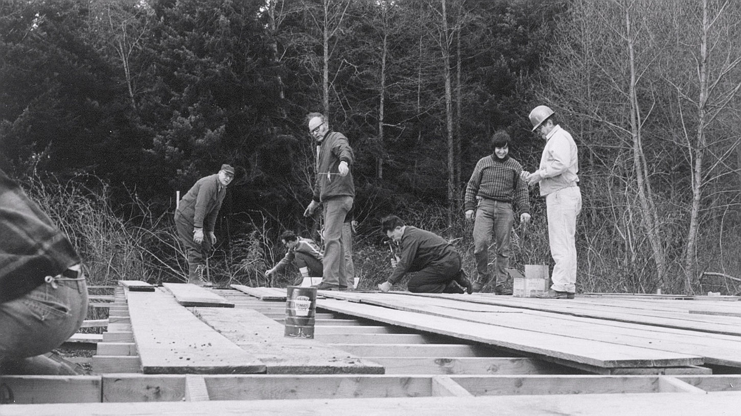A group of men building a foundation.