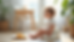Eye-level view of a small child sitting on a potty with a plate of snacks nearby