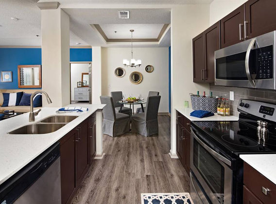 Arium Vinings renovated units - wall removal at kitchen.jpg