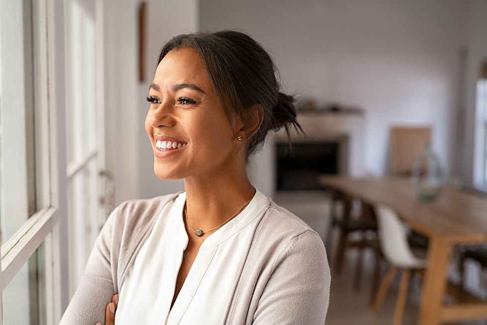 woman smiling confidently looking