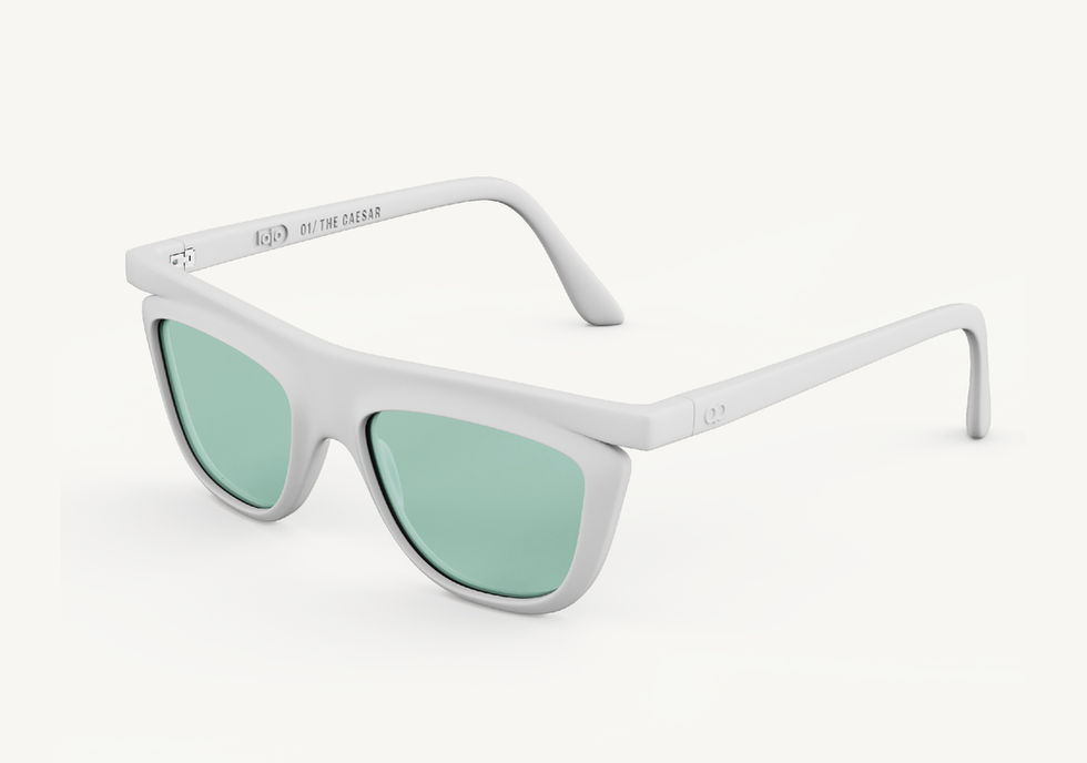 The Caesar sunglasses with a white rectangular frame and aqua green lenses, angled side view showing the temples.