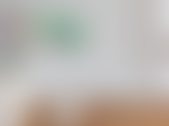 cleaning a wall with a microfiber cloth