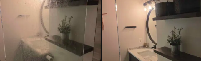 Split bathroom vanity: foggy glass on left, clear on right, with mirror, potted plant, and warm lights in a modern bathroom after a sparkling homes cleaning