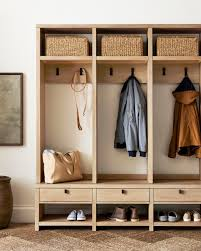 A wide-angle, bright, and airy shot of a perfectly organized entryway in minnesota