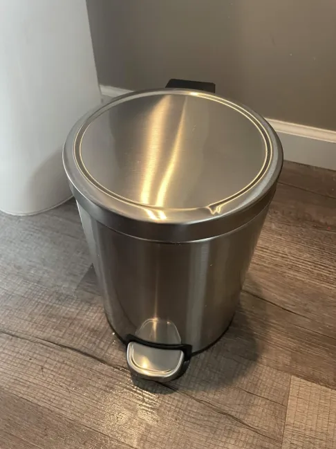 clean polished bathroom trash can after a sparkling homes deep clean
