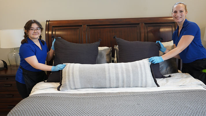 Friendly cleaning technicians from Sparkling Homes Cleaning, ready to tackle your home
