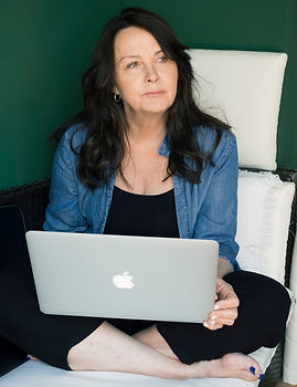 SUSANA AIKIN with computer.jpeg