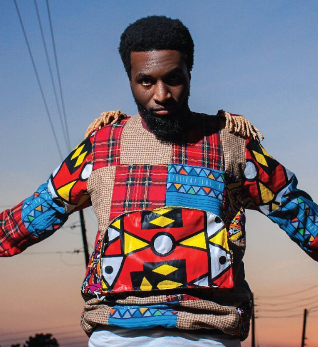 Colorful patchwork sweater by African designer