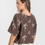 Miniatura: Blusa palms