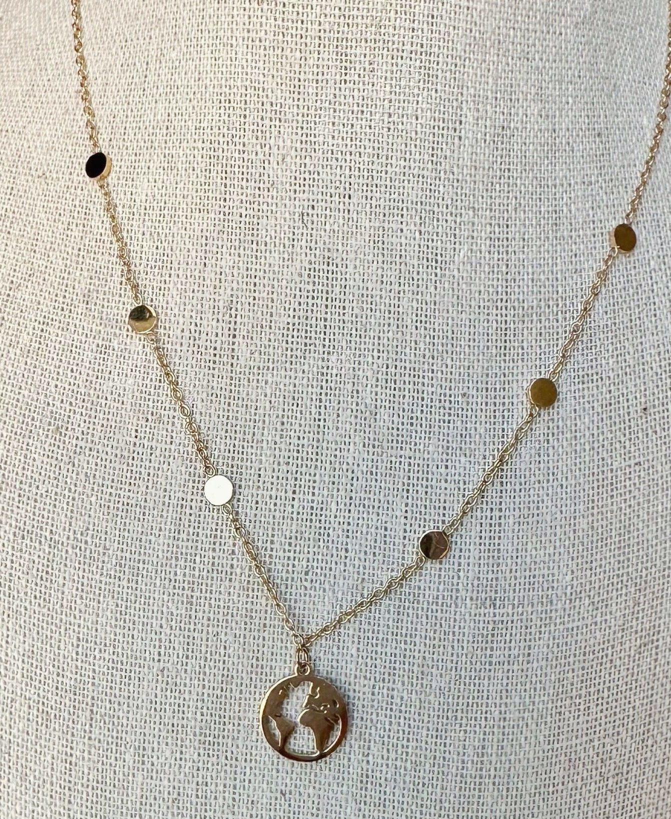 Colgante acero mundo