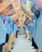 Camp counselors welcoming kids  into their washington state summer camp