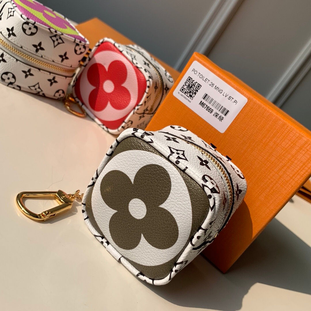 LOUIS VUITTON CUBE COIN PURSE