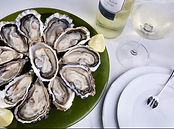 Ostras y gastronomía típica del occidente de Asturias con productos frescos del mar