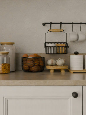 Simple rental kitchen counter with basic low-cost cooking essentials, perfect for a new migrant’s first apartment kitchen.