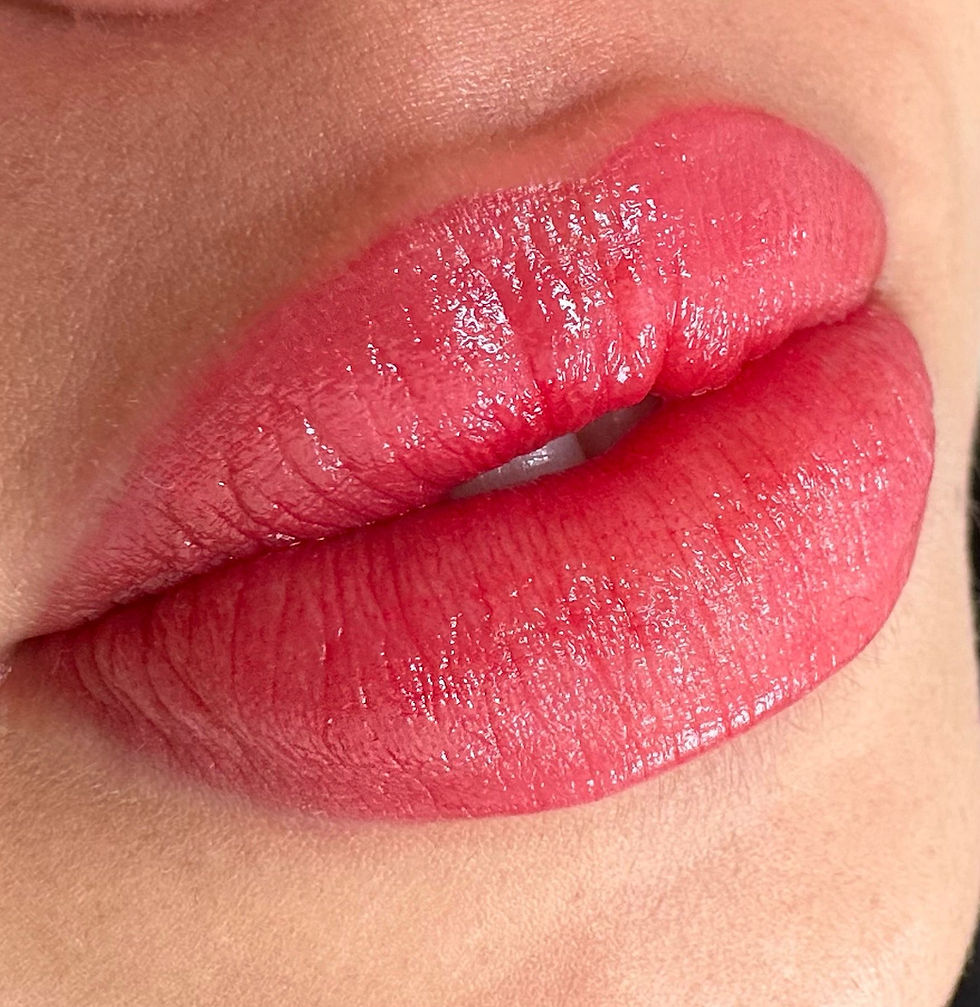 Close-up of soft pink lips showing natural enhancement and smooth texture
