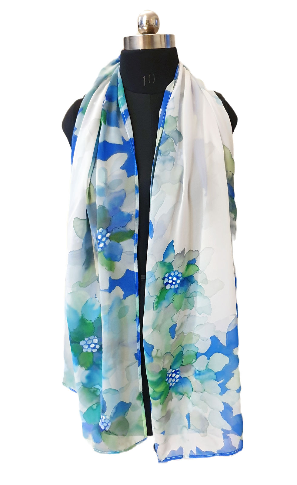 Thumbnail: A hand painted white silk stole featuring soft blue and green floral artwork, styled in a neckwrap on a mannequin