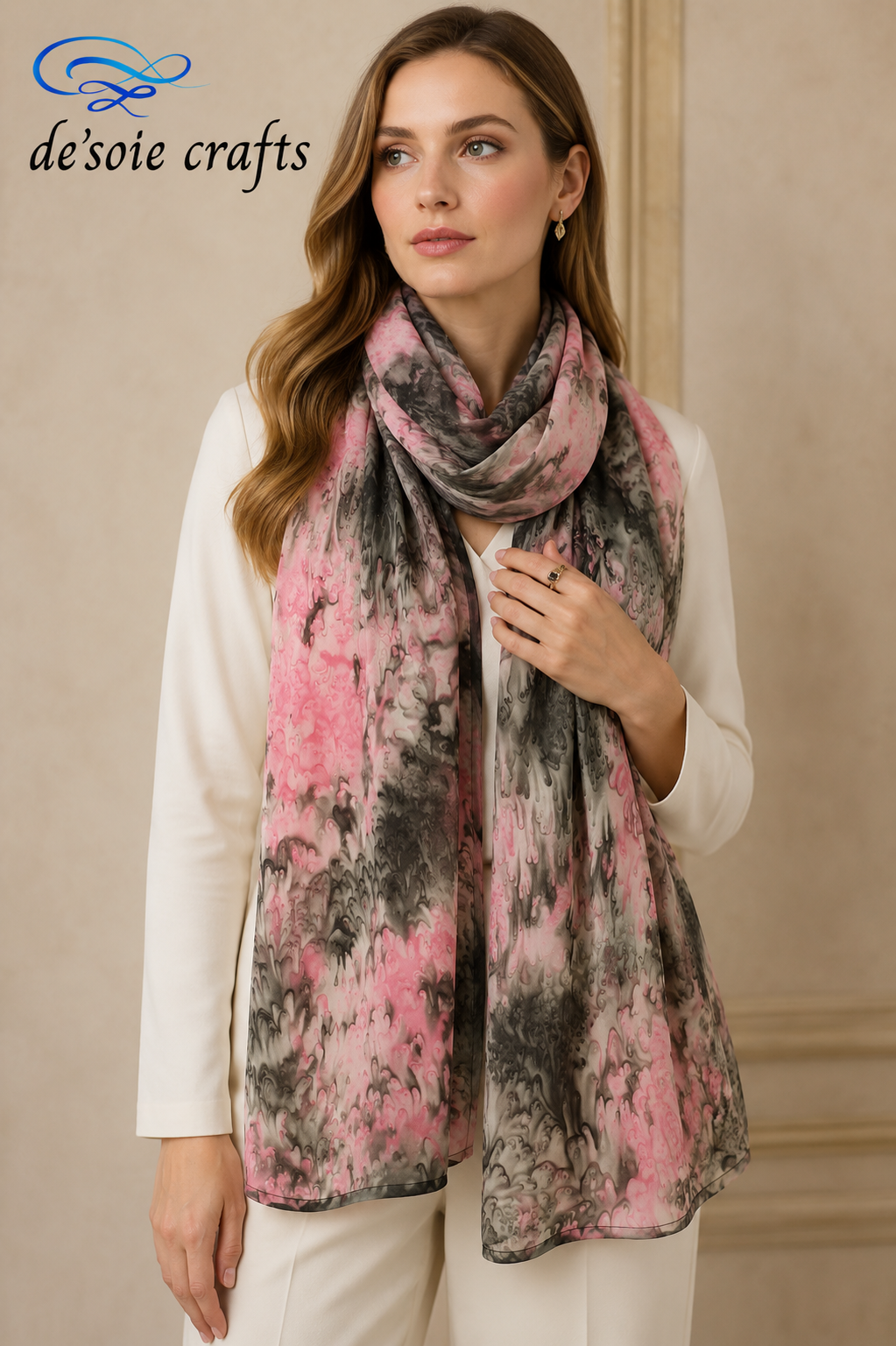 Elegant Caucasian model wearing a hand-painted pink, grey & black marbled pure silk stole gracefully wrapped around her neck