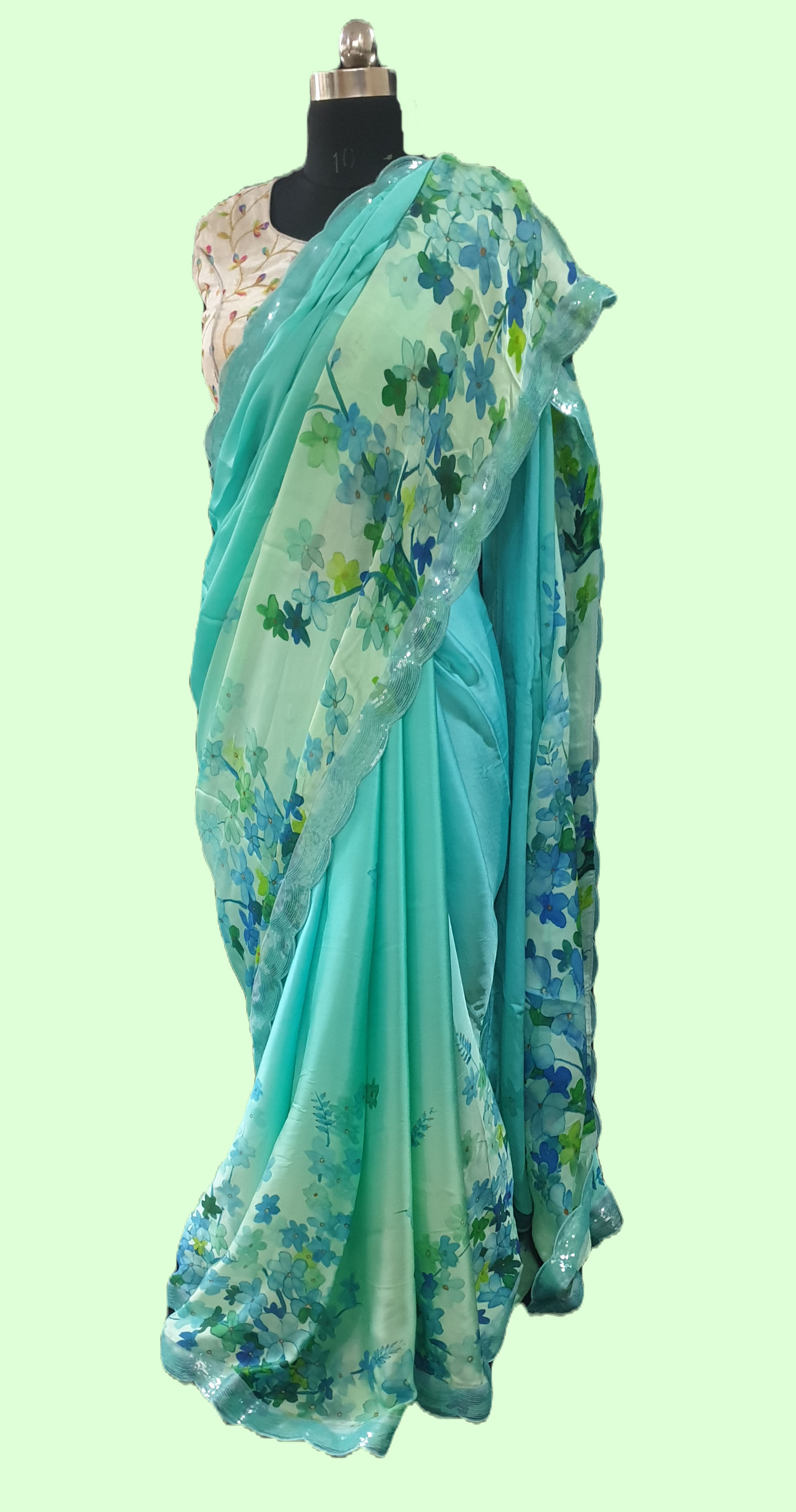 Turquoise green floral satin georgette saree
