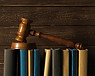 gavel-with-books-old-wooden-desk.jpg