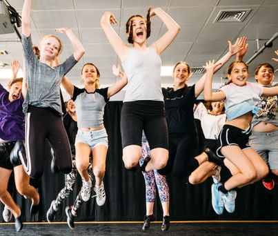 Young performers taking part in a West End theatre workshop