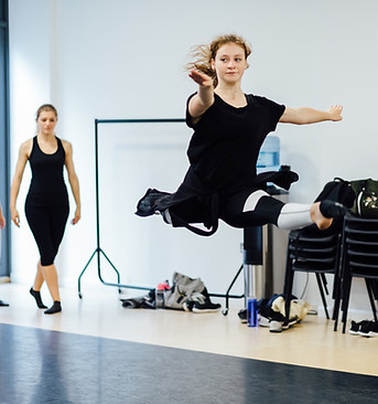 An adult dancing at our musical theatre study abroad summer programme
