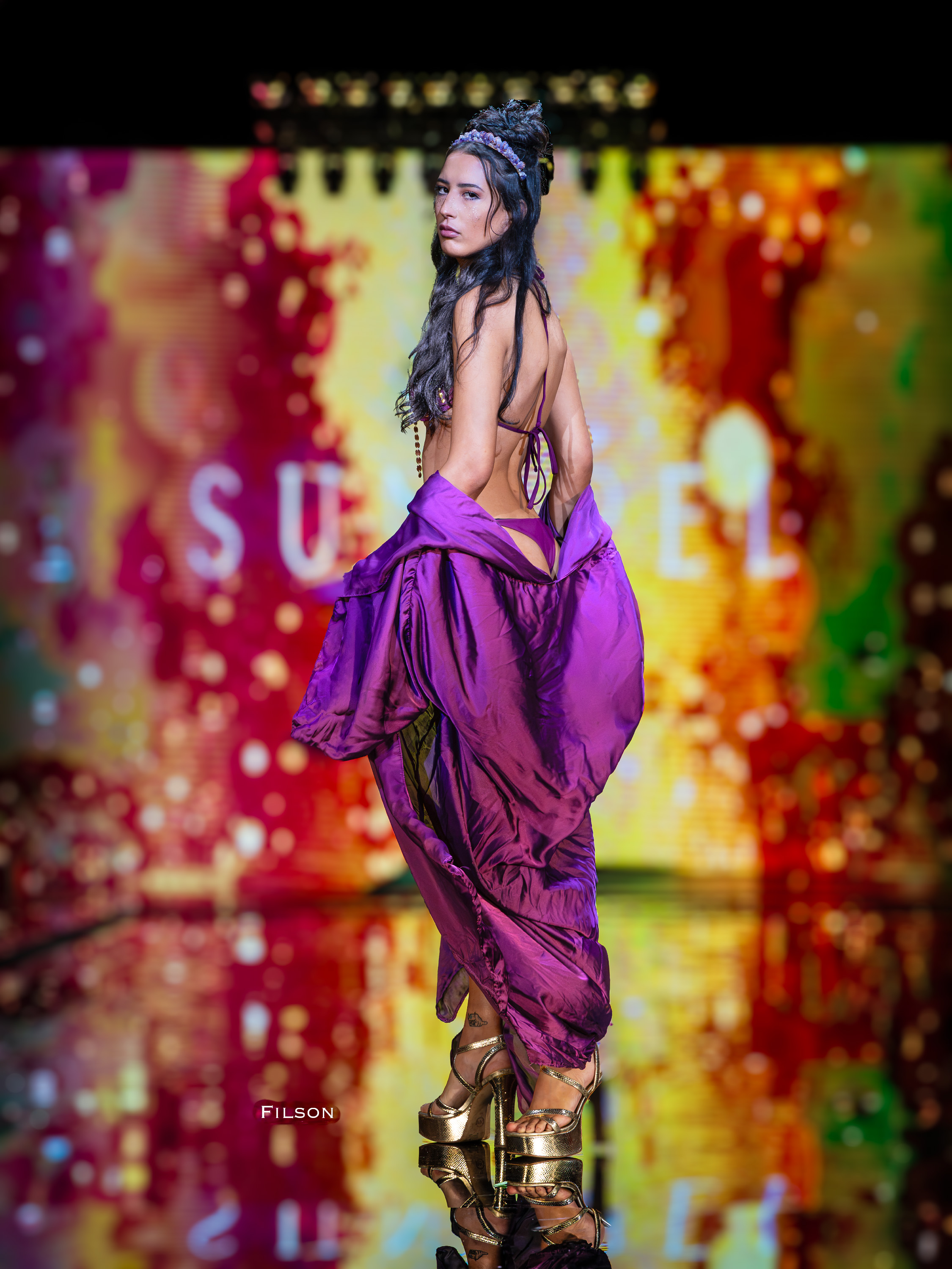 Fashion Photographer Tony Filson captured this stunning creation on the runway by Designer Mali Hays of Luxe Isle at Miami Swim Week of model Janell Castro.  Spectacular background and show produced by Art Hearts Fashion. This photograph will appear in the 2027 Issue of World Fashion Media News