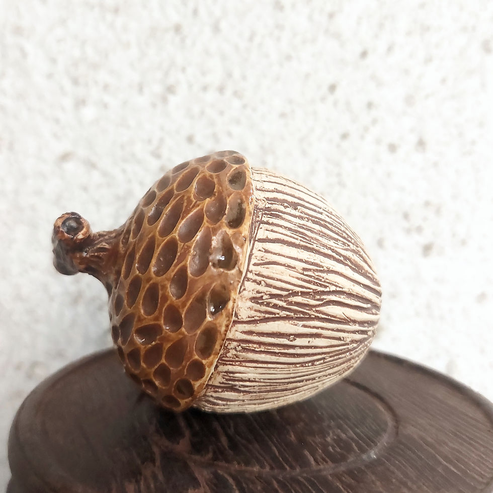 Thumbnail: Rustic Acorn Rattling Charm